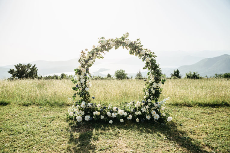 wedding arch with mountains in background